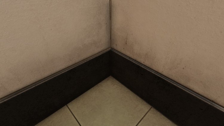 The baseboard is baked into the wall normal map. It's just one flat piece with no geometry for the base.